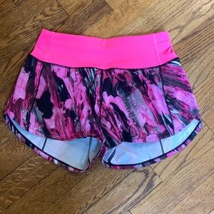 Black and Pink Lululemon Speed Up Shorts